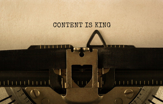 Text CONTENT IS KING typed on retro typewriter