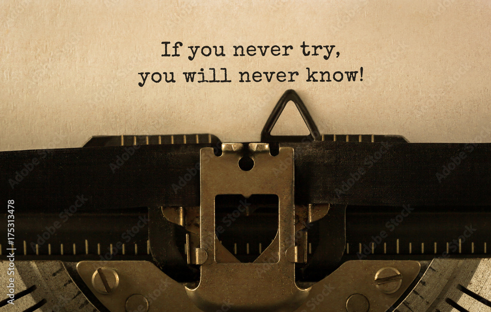 Aufkleber Text If you never try, you will never know typed on retro typewriter