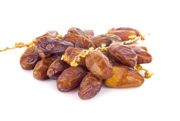 dried fruits from date palm isolated on white background