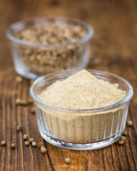 White Pepper on vintage wooden background