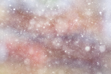 Obraz premium Snowfall texture of snowflakes on blurred background