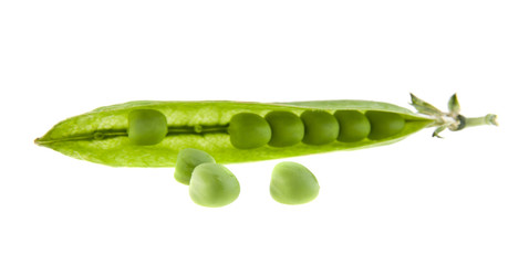 Green peas isolated on white background closeup