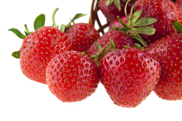 Red and juicy strawberries isolated on white background closeup