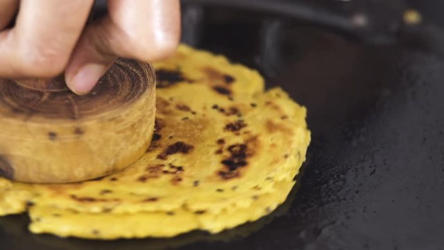Cooking with a Wooden Utensils-Closeup Shot