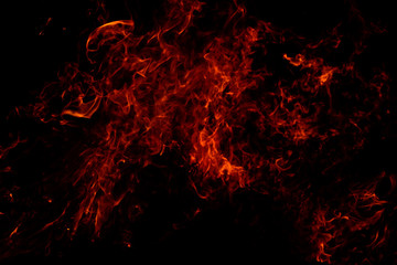 flame from an explosion on a black background