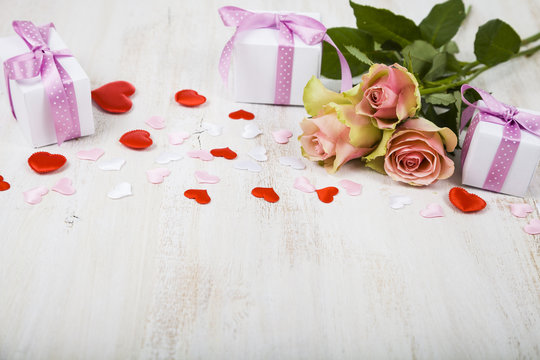 Pink roses,  gift and hearts