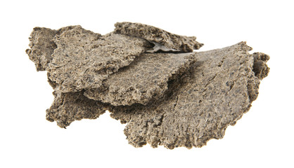 pressed sunflower seeds isolated on a white background closeup
