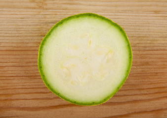zucchini on a wooden background closeup