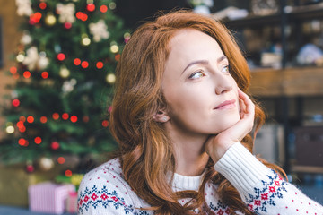 thoughtful woman in warm sweater