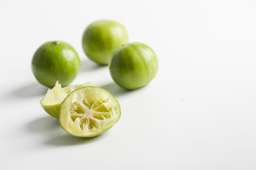Group of lemons on white table