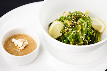 Seaweed salad with a sauce