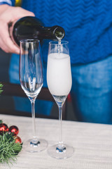 pouring champagne