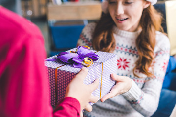 mother taking gift from child