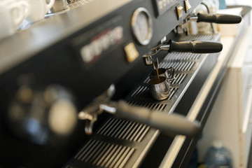 Fototapeta na wymiar Professional coffee machine used in coffee industry
