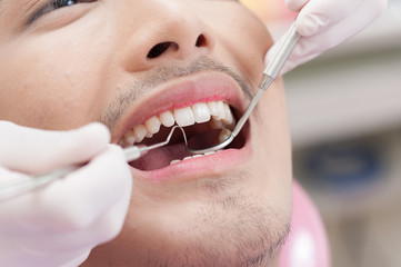 A man with dental care activity