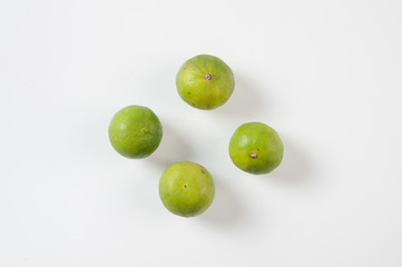 Group of lemons on white table