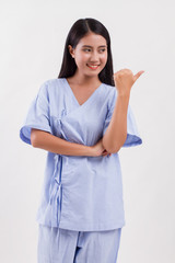 woman patient pointing thumb up gesture away