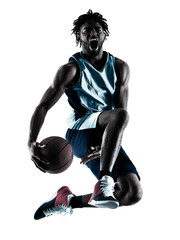 Obraz premium one afro-american african basketball player man isolated in silhouette shadow on white background