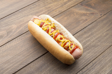 Hotdogs on wooden table. Fastfood.