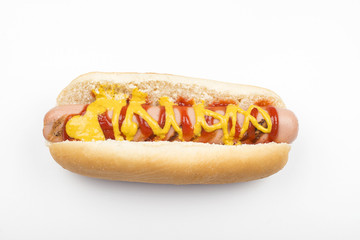 Hot dog with ketchup and mustard on white background. Isolated. Fastfood.
