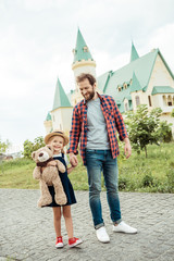 Obraz premium family walking in park