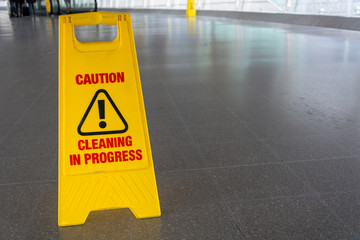 Yellow cleaning in process sign on the floor