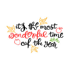 It's the most wonderful time of the year. Lettering. Autumn leaves. Apple. Isolated object on white background.