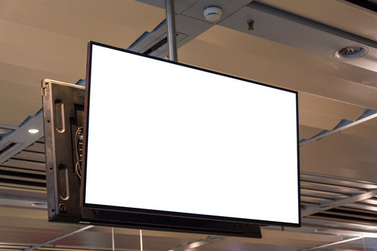 Blank ad space screen hanging from the ceiling