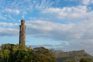 The Nelson monument on Calton Hill in Edinburgh with Arthurs Seat in the background