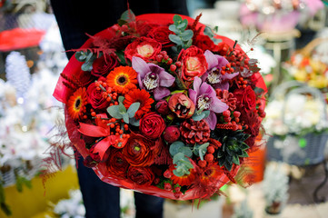 Very bright and beautiful red bouquet of flowers