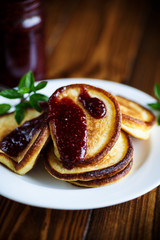 sweet pancakes with raspberry jam