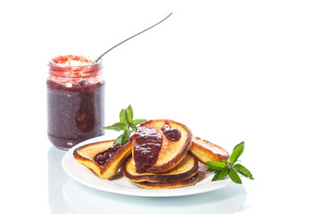 sweet pancakes with raspberry jam