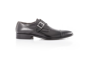 Close up of a red mens loafers on white background with reflection. Fashion advertising shoes photos.