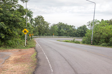 Curved roads require carefulness.