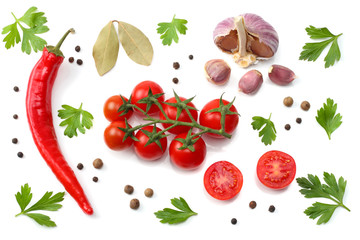 slice of tomato with chili pepper, garlic and parsley isolated on white background. top view