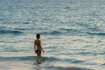 Classy woman on the beach
