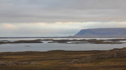 Fototapeta na wymiar Cloudy morning in the westfjords of Iceland. Coastal landscape near Budardalur.