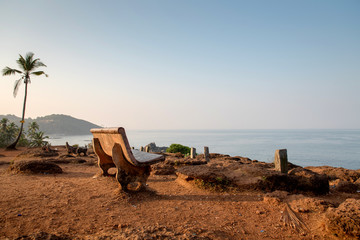 Bench on vagator beach in Goa, India. Beautiful view.