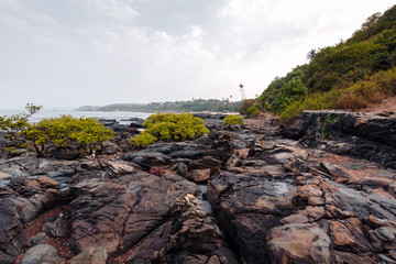 Beach stones background in Goa