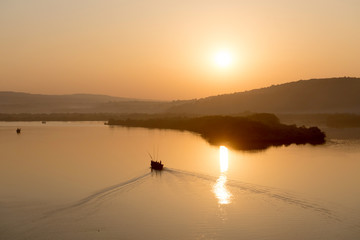 Fototapeta na wymiar Boat in dawn, India, Goa