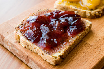 Damson Plum Jam on bread with Apricot jam