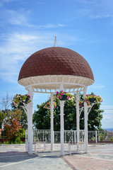 A beautiful gazebo in the background of blue sky