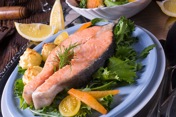 salmon with butter fried potato puree and salad
