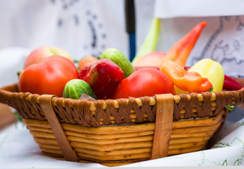 tomatoes and peppers in the basket