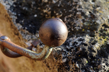 kugelförmiges Endstück eines eisernen Handlaufs