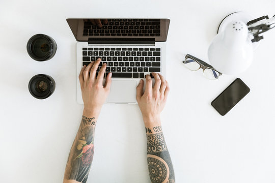 Male Hands Typing On Laptop