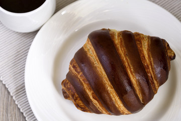 French breakfast with croissant and coffee