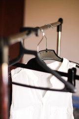 White wardrobe on the hangers