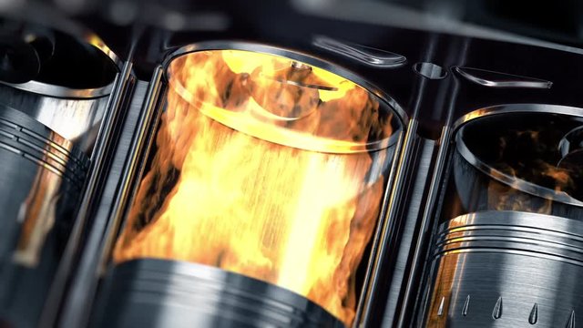 A close-up of engine in slow motion with explosions of fuel