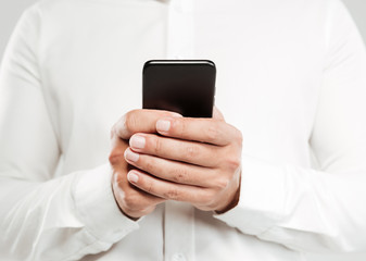 Cropped image of young man chatting by phone.